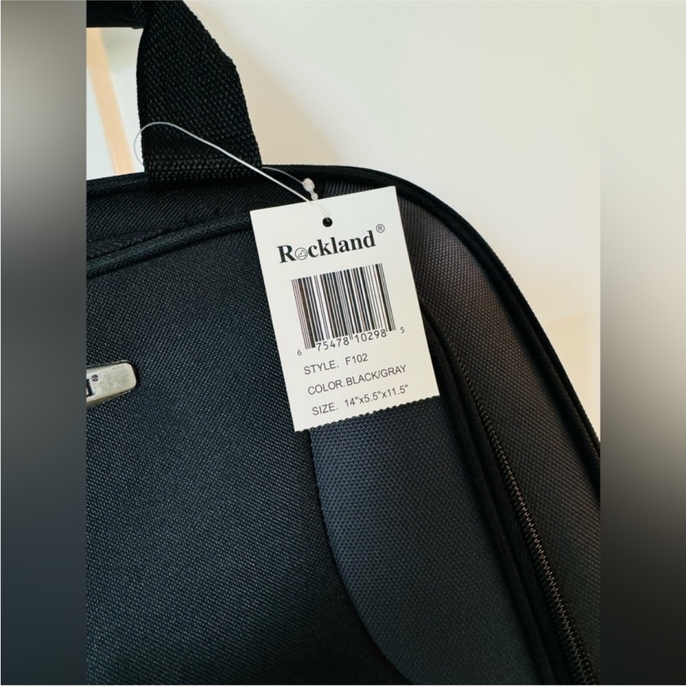 Black Travel Bag with Durable Fabric and Sleek Design - Picture 3 of 6